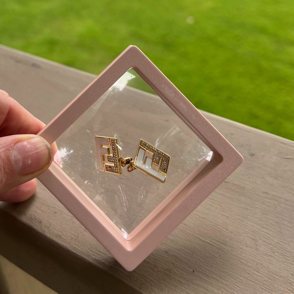 Forever Fendi costume earrings, white, gold and faux diamond chips